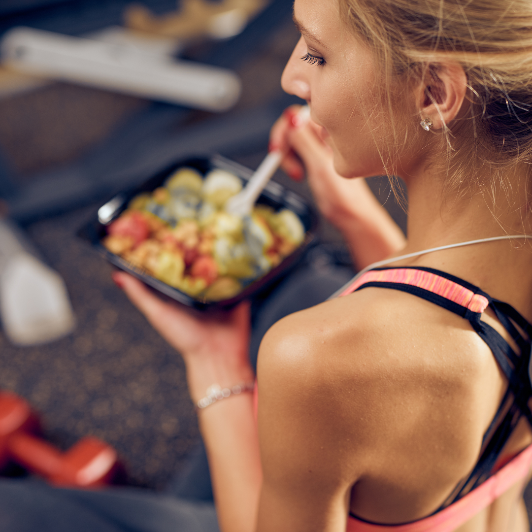 woman eating a healthy meal after consulting with life goals wellness in casper, wyoming offering nutrition coaching